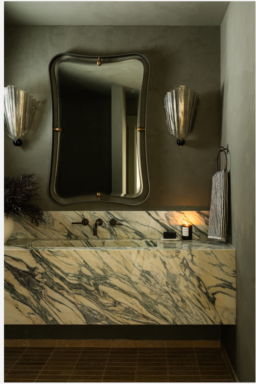 Green marble floating vanity dramatic bathroom Chicago
