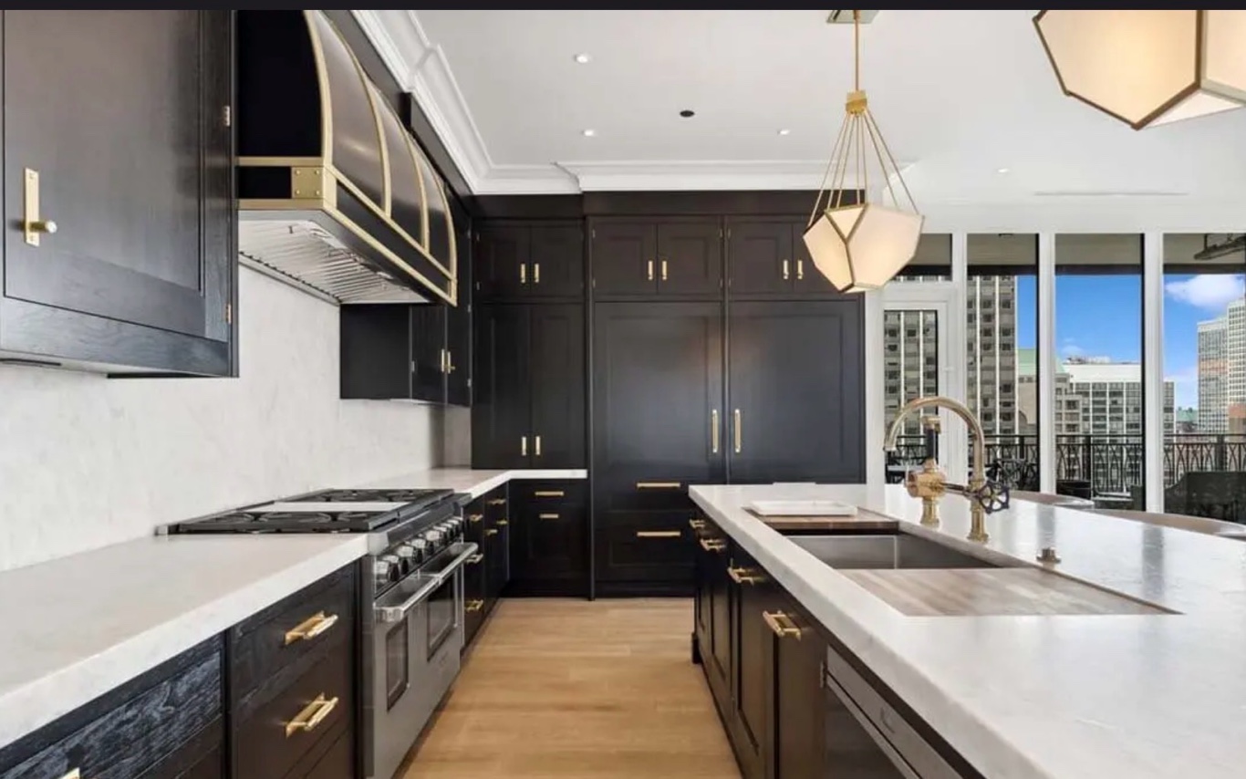 Dark cabinet kitchen white marble countertops Chicago