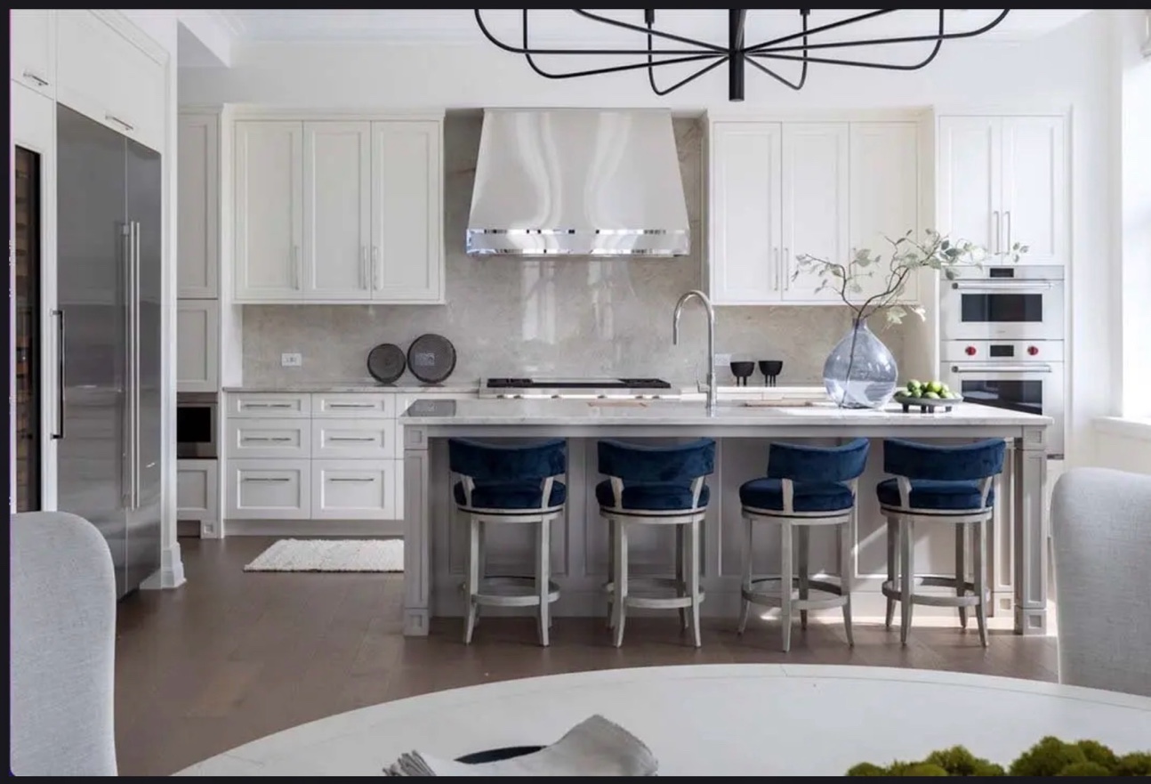 White kitchen marble countertops blue stools Chicago
