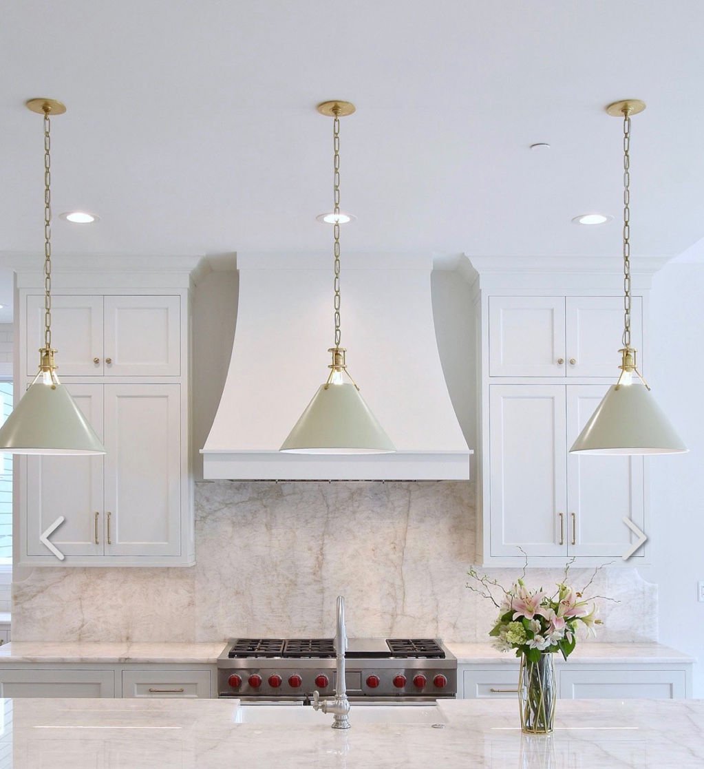 White kitchen quartzite backsplash gold pendants Chicago